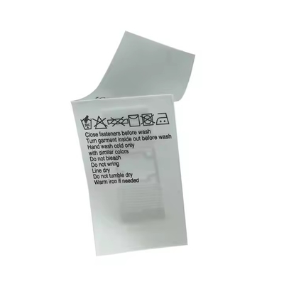 Disesuaikan UHF RFID Pakaian Tag Tekstil Perawatan Laundry Tag Cuci Tanda Label